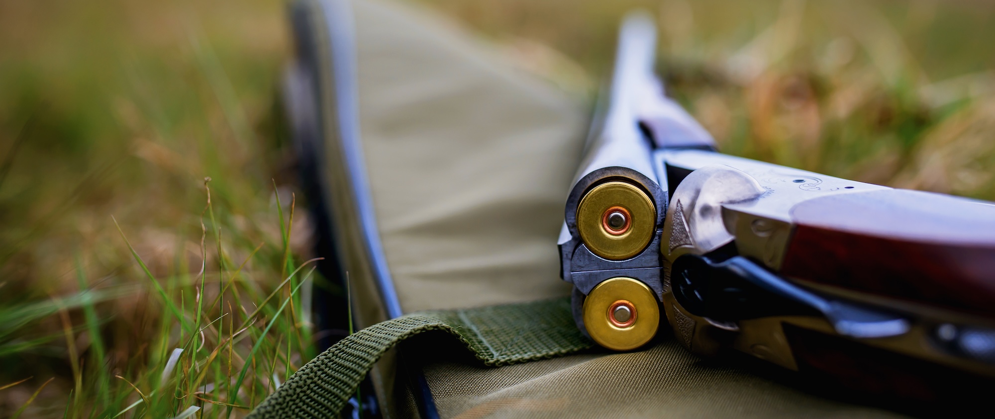 Hunting rifle with a bullets. Sport and recreation concept